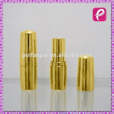 Small gold empty lipstick tube